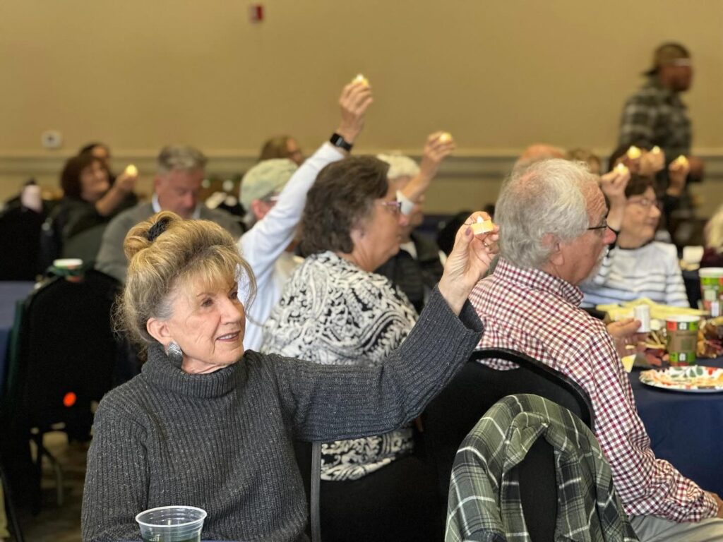 Light Up Your Life - Brisbane event - November 12, 2025 -candles being held by attendees
